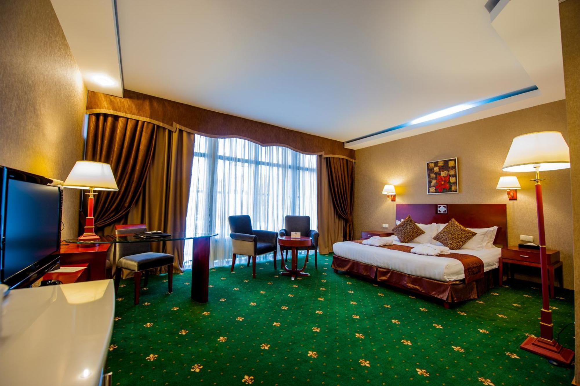 Hotel Goldman Empire à Astana Chambre photo